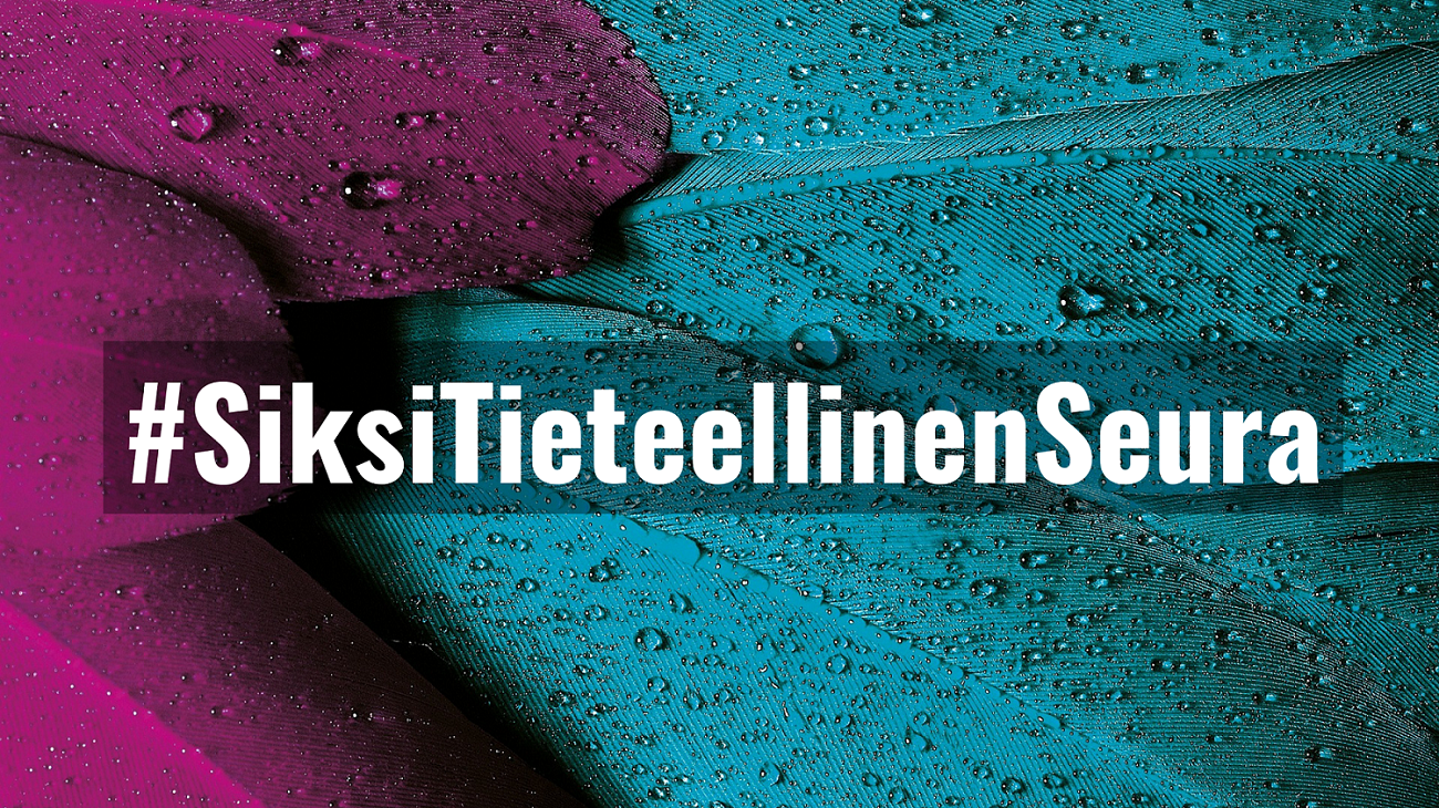 Lähikuva sulista, joiden päällä teksti #SiksiTieteellinenSeura.